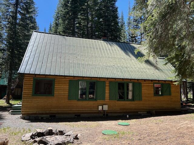 80 Diamond Lake Loop Chemult, OR 97731 - Photo 8 of 36 a view of a house with a yard
