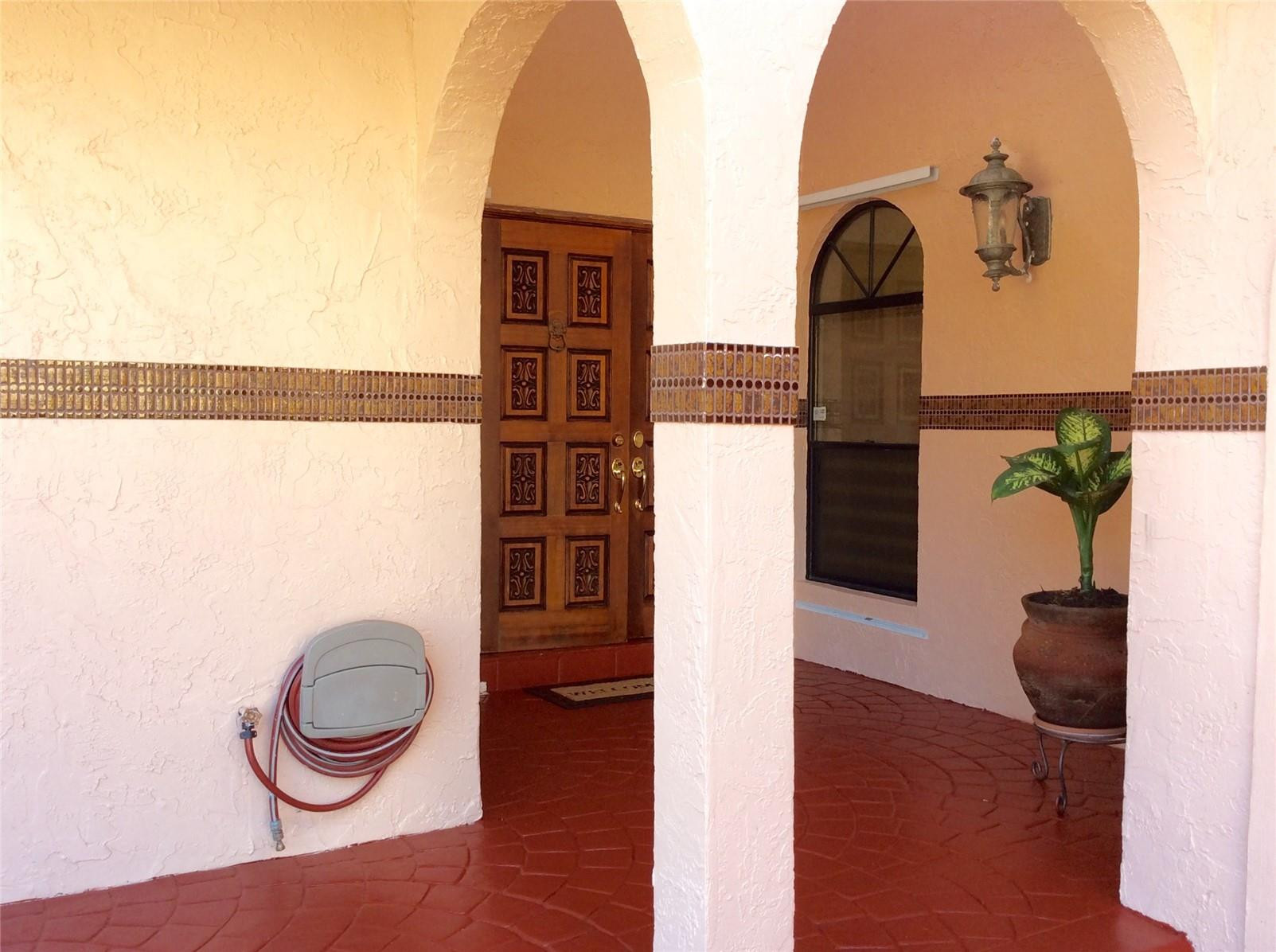 22753 Marbella Circle Boca Raton, FL 33433 - Photo 18 of 22 Beautiful hard wood double door entry.