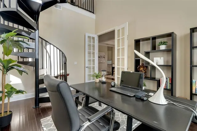 a view of a workspace with furniture