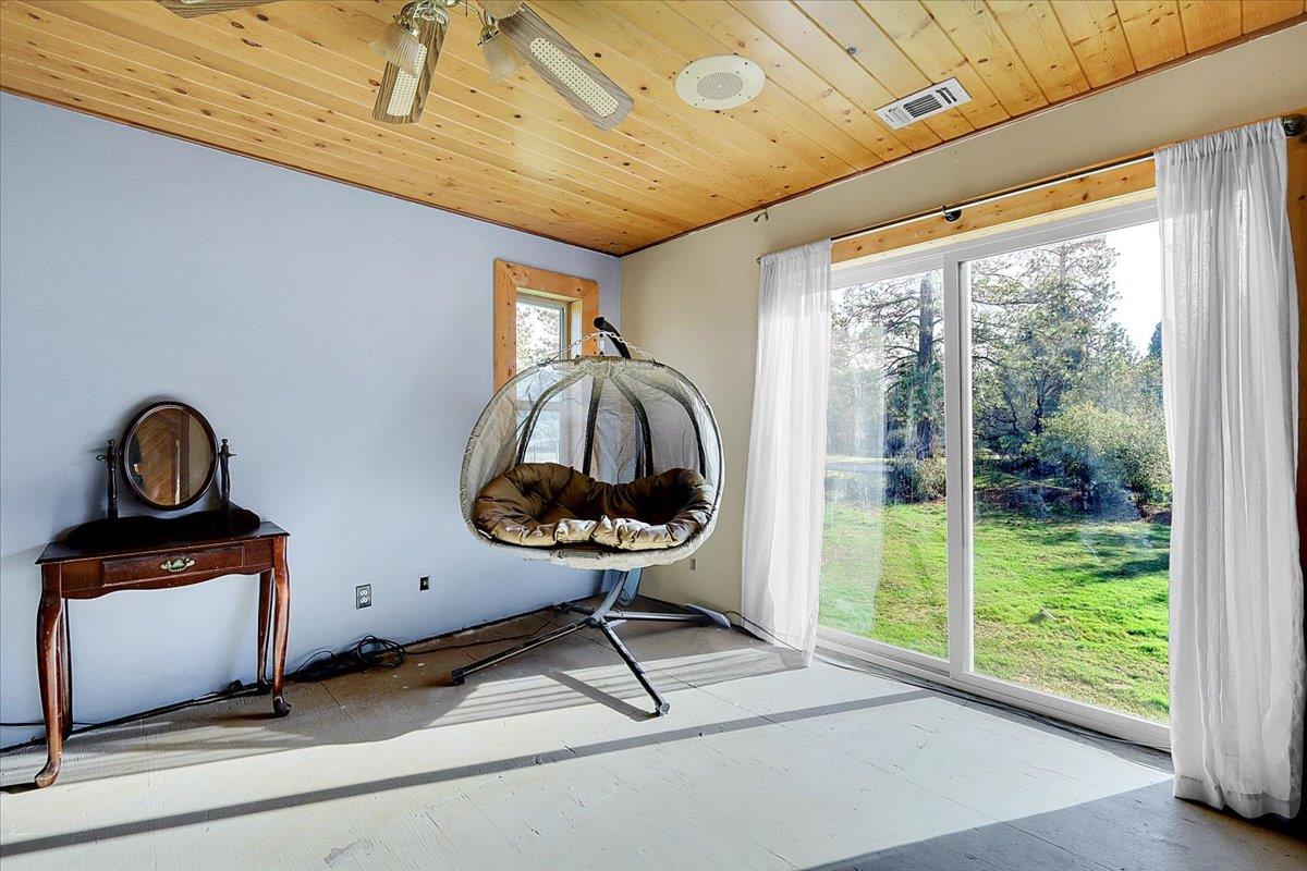 13980 Mountain House Road Penn Valley, CA 95946 - Photo 31 of 58 a room with furniture and a window