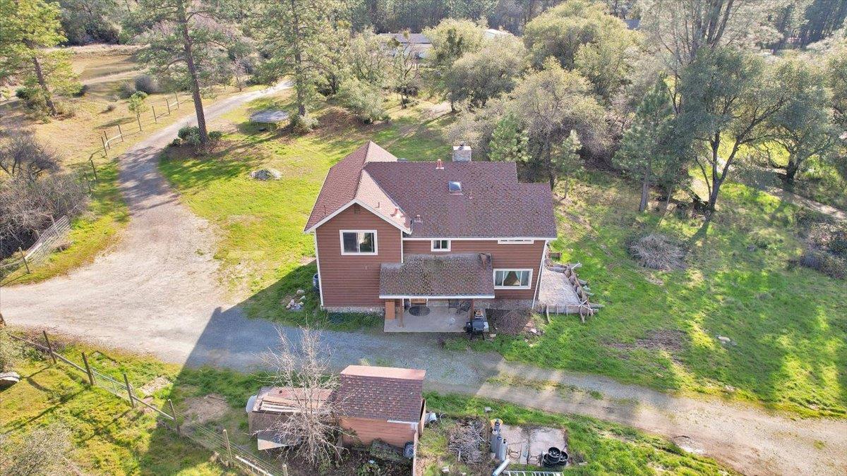 13980 Mountain House Road Penn Valley, CA 95946 - Photo 55 of 58 a view of a house with a yard