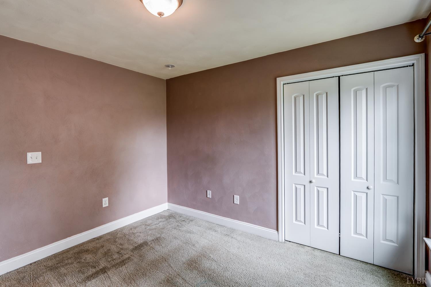 1057 Old Trail Road Forest, VA 24551 - Photo 41 of 49 an empty room with windows