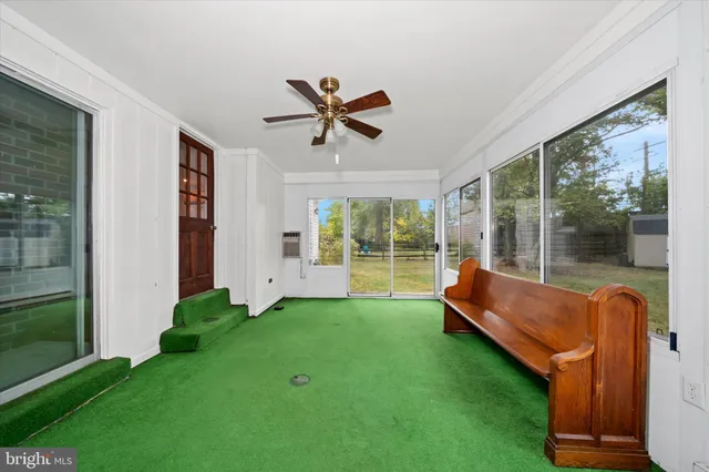 a living room with yard and balcony