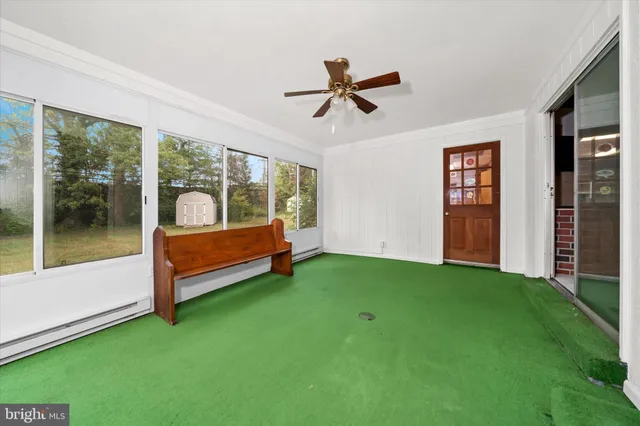 a view of a porch with a backyard