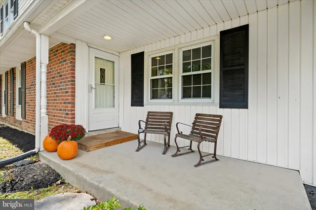 a balcony with furniture and window