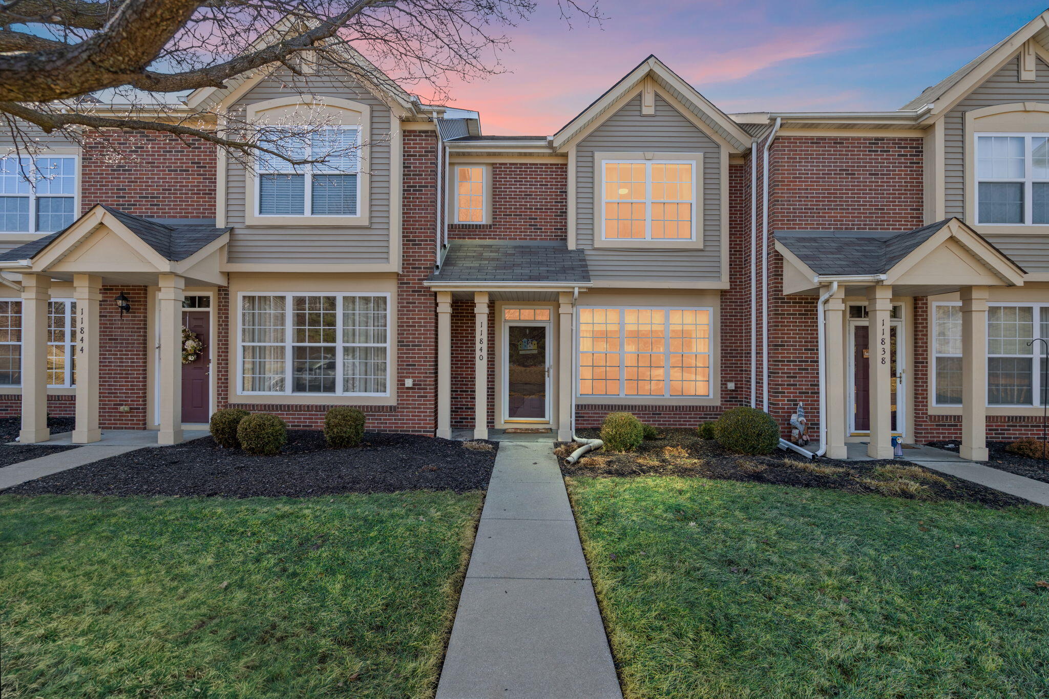 11840 Broadway Crown Point, IN 46307 - Photo 1 of 18 a front view of a house with a yard and outdoor seating