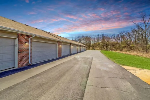 a view of a backyard of the house