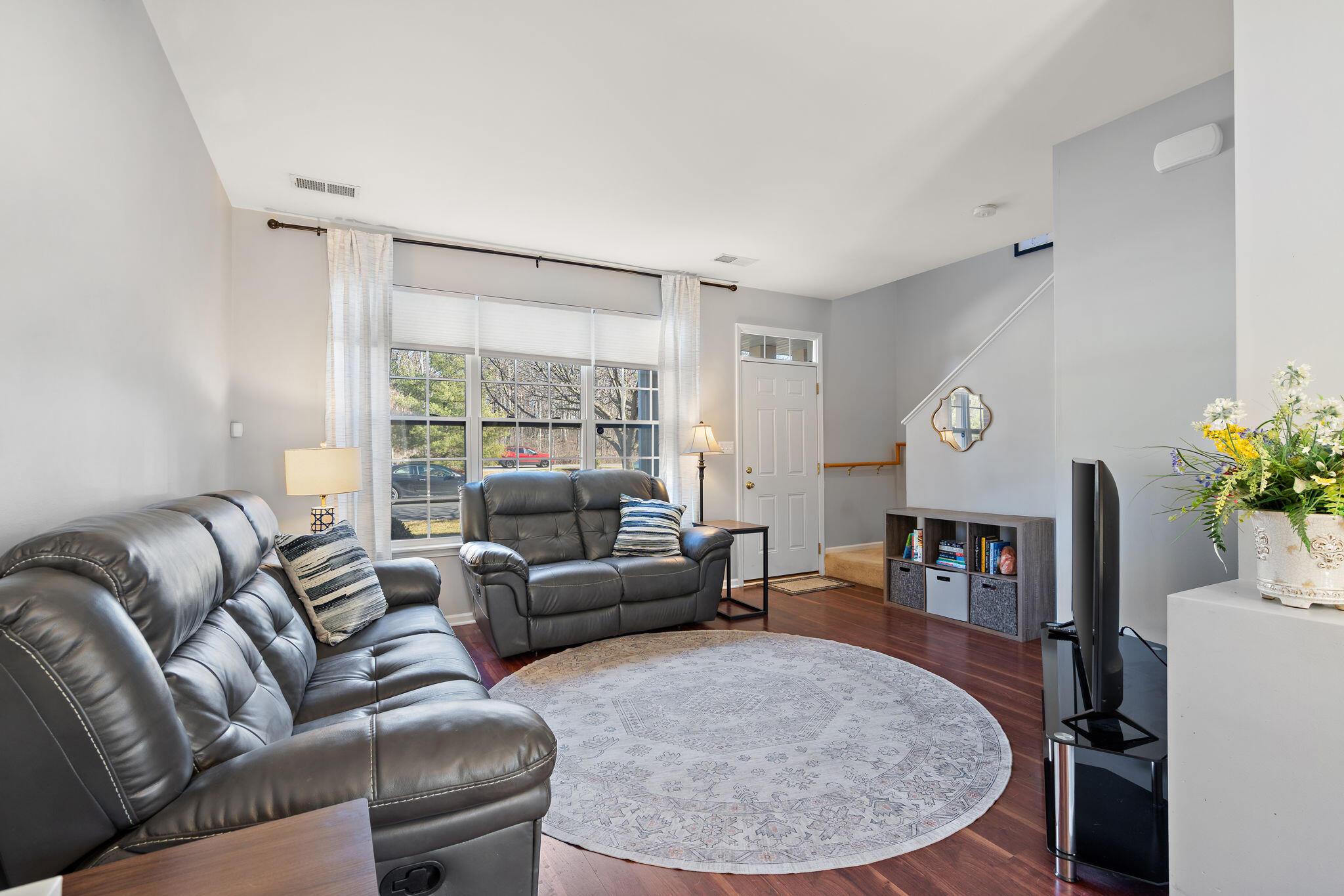11840 Broadway Crown Point, IN 46307 - Photo 4 of 18 a living room with furniture and a wooden floor