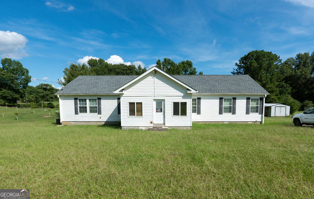 1211 River Road Fort Valley, GA 31030 - Photo 1 of 1 a front view of a house with a yard