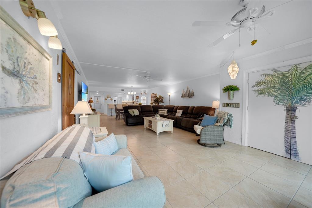 601 Shreve Street, Unit 16A Punta Gorda, FL 33950 - Photo 14 of 52 a living room with furniture and a lamp