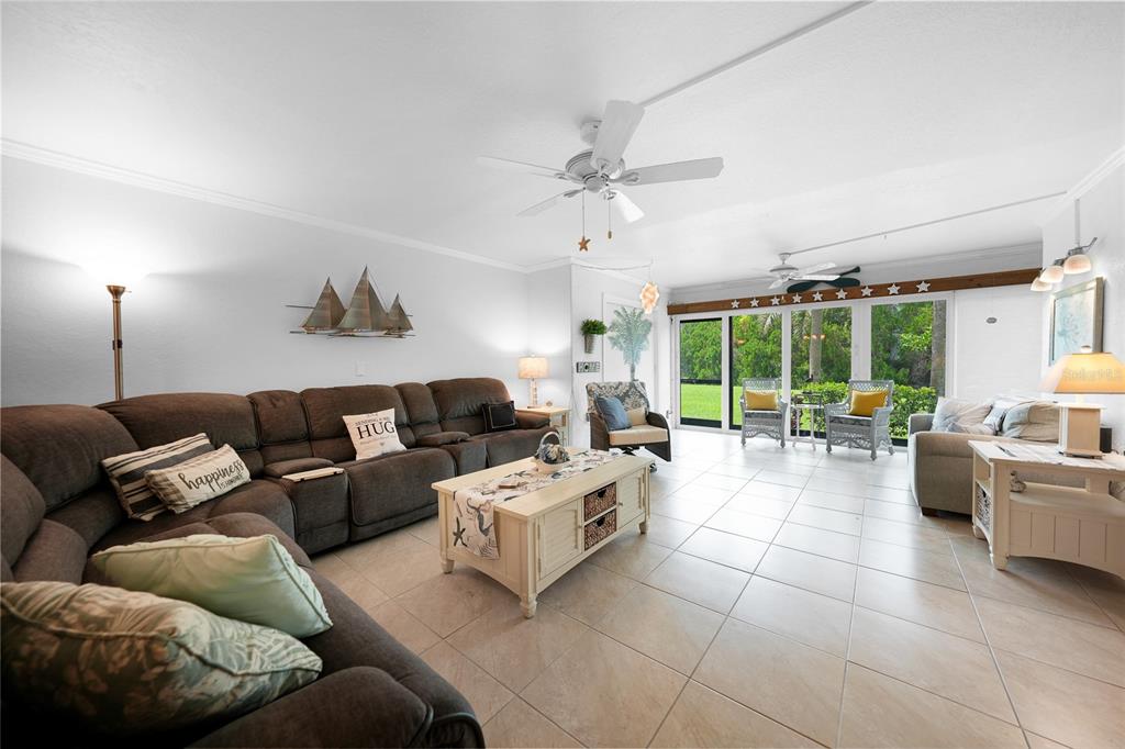 601 Shreve Street, Unit 16A Punta Gorda, FL 33950 - Photo 15 of 52 a living room with furniture and a large window