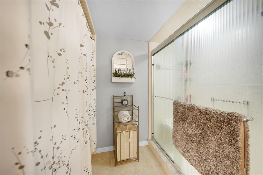 601 Shreve Street, Unit 16A Punta Gorda, FL 33950 - Photo 26 of 52 a bathroom with a bathtub and shower