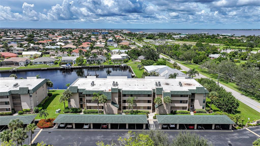 601 Shreve Street, Unit 16A Punta Gorda, FL 33950 - Photo 37 of 52 a view of house with yard and ocean view