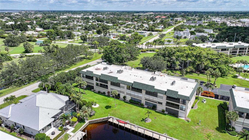 601 Shreve Street, Unit 16A Punta Gorda, FL 33950 - Photo 44 of 52 an aerial view of a house with a garden