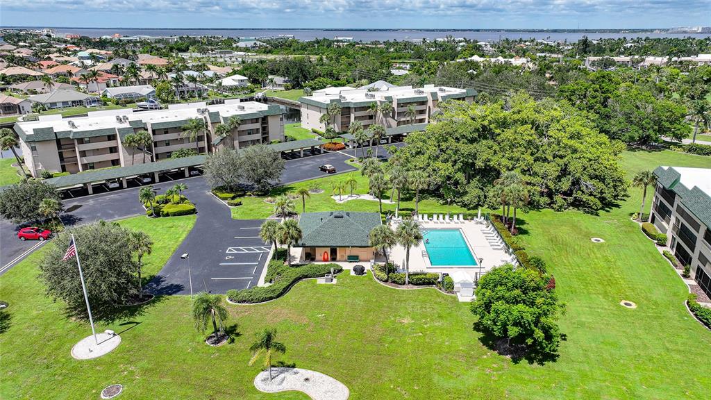 601 Shreve Street, Unit 16A Punta Gorda, FL 33950 - Photo 49 of 52 an aerial view of a house with yard swimming pool and outdoor seating