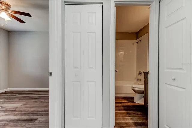 a bathroom view of a toilet and a sink