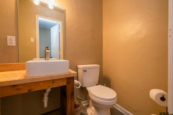 a bathroom with a sink and a toilet