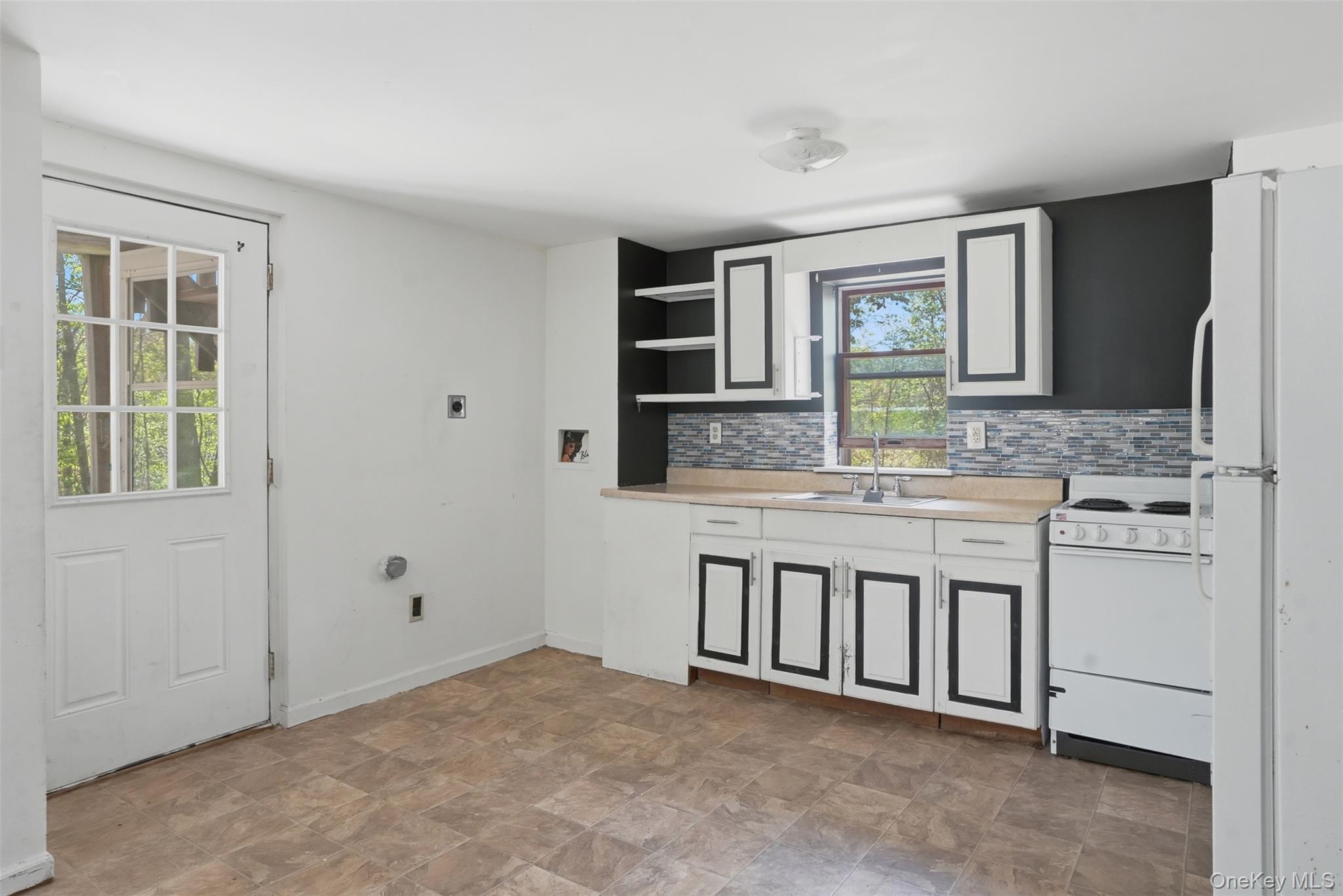 6 Short Road Wurtsboro, NY 12790 - Photo 37 of 48 a bathroom with a granite countertop sink and mirror