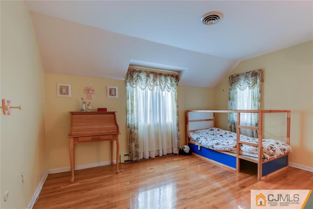 90 Union Valley Road Monroe Township, NJ 08831 - Photo 16 of 25 a bedroom with furniture and a window