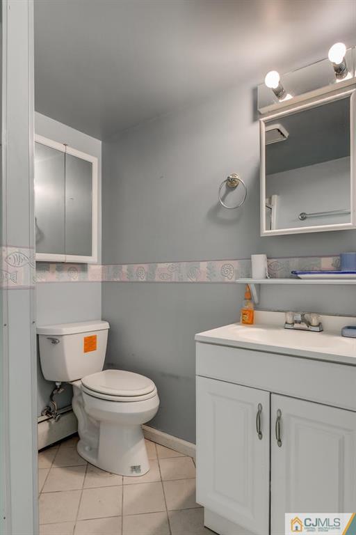 90 Union Valley Road Monroe Township, NJ 08831 - Photo 24 of 25 a bathroom with a sink toilet and mirror