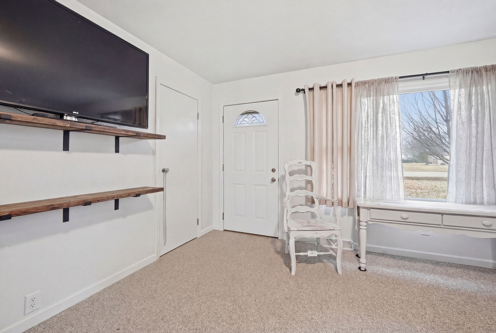 200 Ramona Avenue Rochelle, IL 61068 - Photo 7 of 21 a living room with furniture and a window