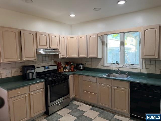 312 Centre Avenue, Unit 1 Secaucus, NJ 07094 - Photo 3 of 17 a kitchen with stainless steel appliances granite countertop white cabinets sink and window
