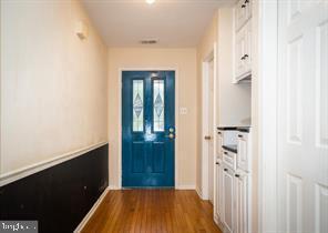 4 Victorian Court Chesterbrook, PA 19087 - Photo 12 of 39 a view of a hallway with wooden floor