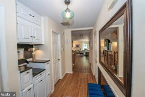 4 Victorian Court Chesterbrook, PA 19087 - Photo 2 of 39 a hallway with wooden floor