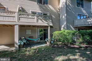 4 Victorian Court Chesterbrook, PA 19087 - Photo 38 of 39 a view of a house with a chairs and table in a patio
