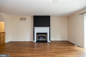 4 Victorian Court Chesterbrook, PA 19087 - Photo 4 of 39 a view of a livingroom with a fireplace