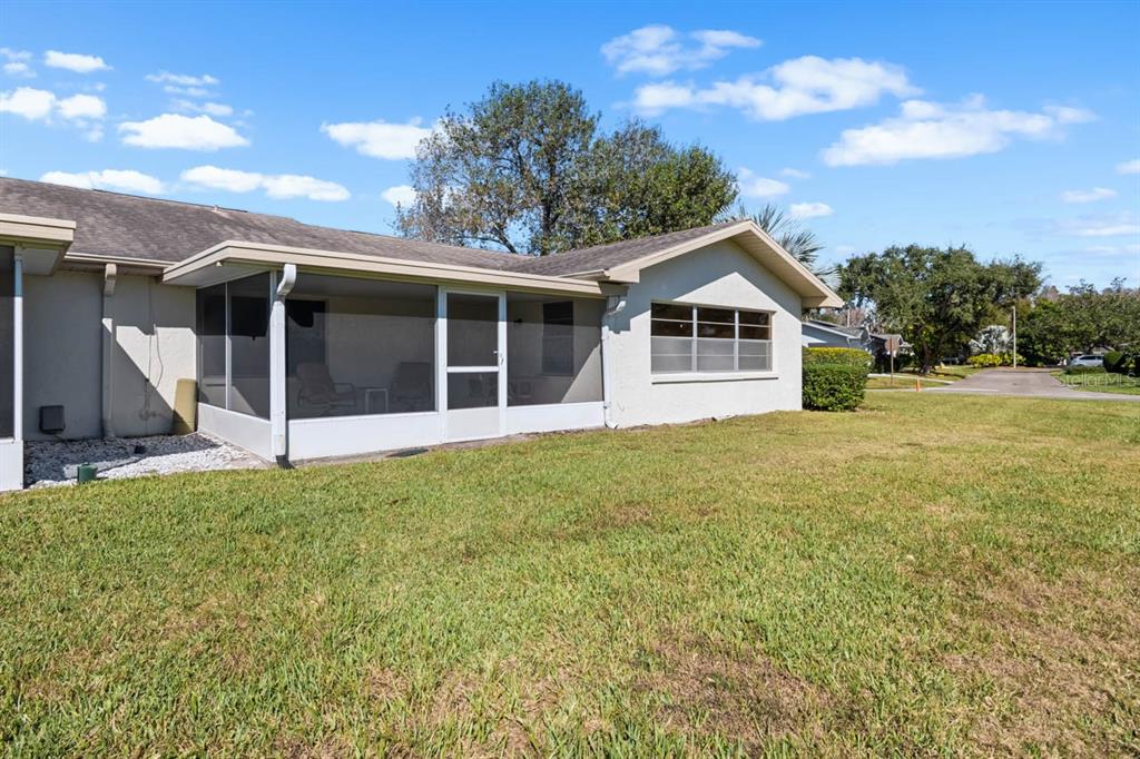 1602 Hovington Circle Sun City Center, FL 33573 - Photo 26 of 47 a view of a house with backyard and garden