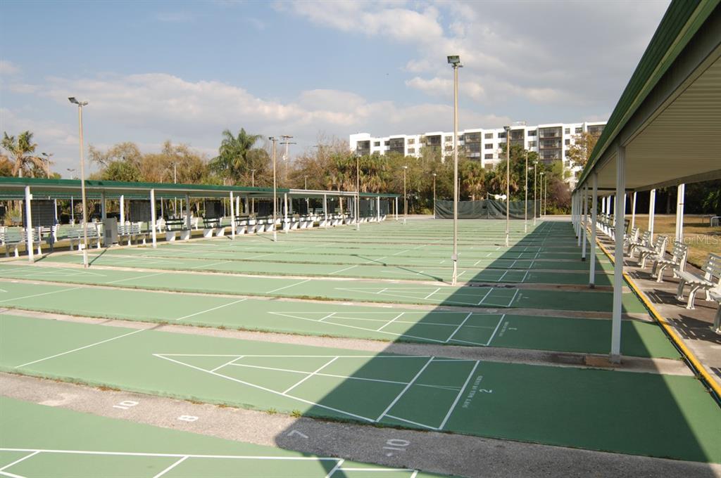 1602 Hovington Circle Sun City Center, FL 33573 - Photo 41 of 47 a tennis court view covered with outdoor space