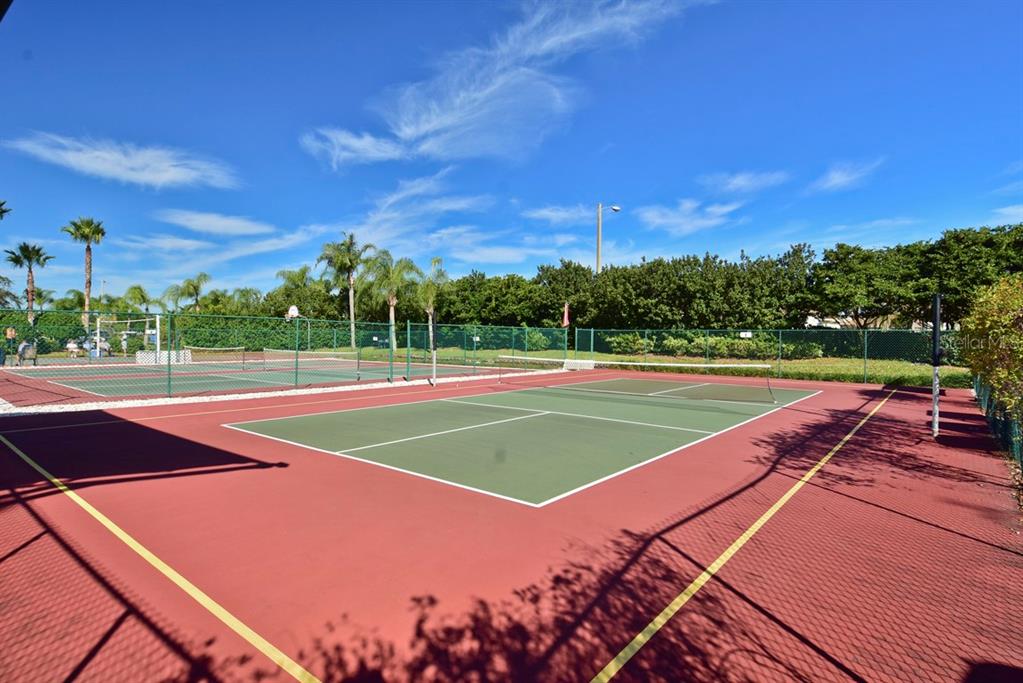 1602 Hovington Circle Sun City Center, FL 33573 - Photo 43 of 47 a view of a tennis court