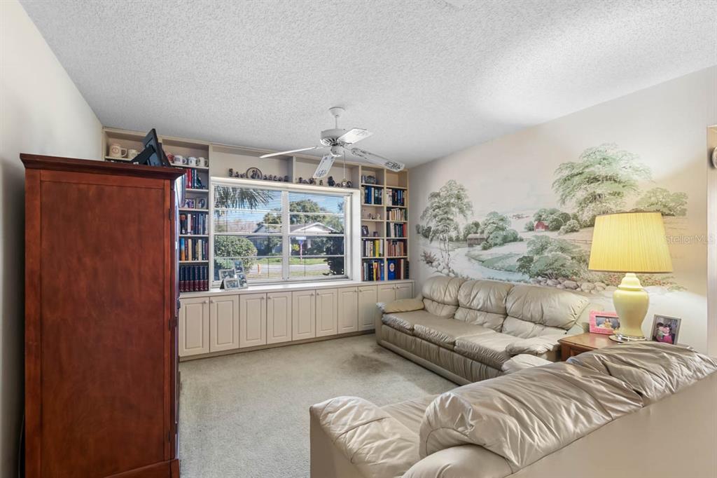 1602 Hovington Circle Sun City Center, FL 33573 - Photo 5 of 47 a living room with furniture and a window