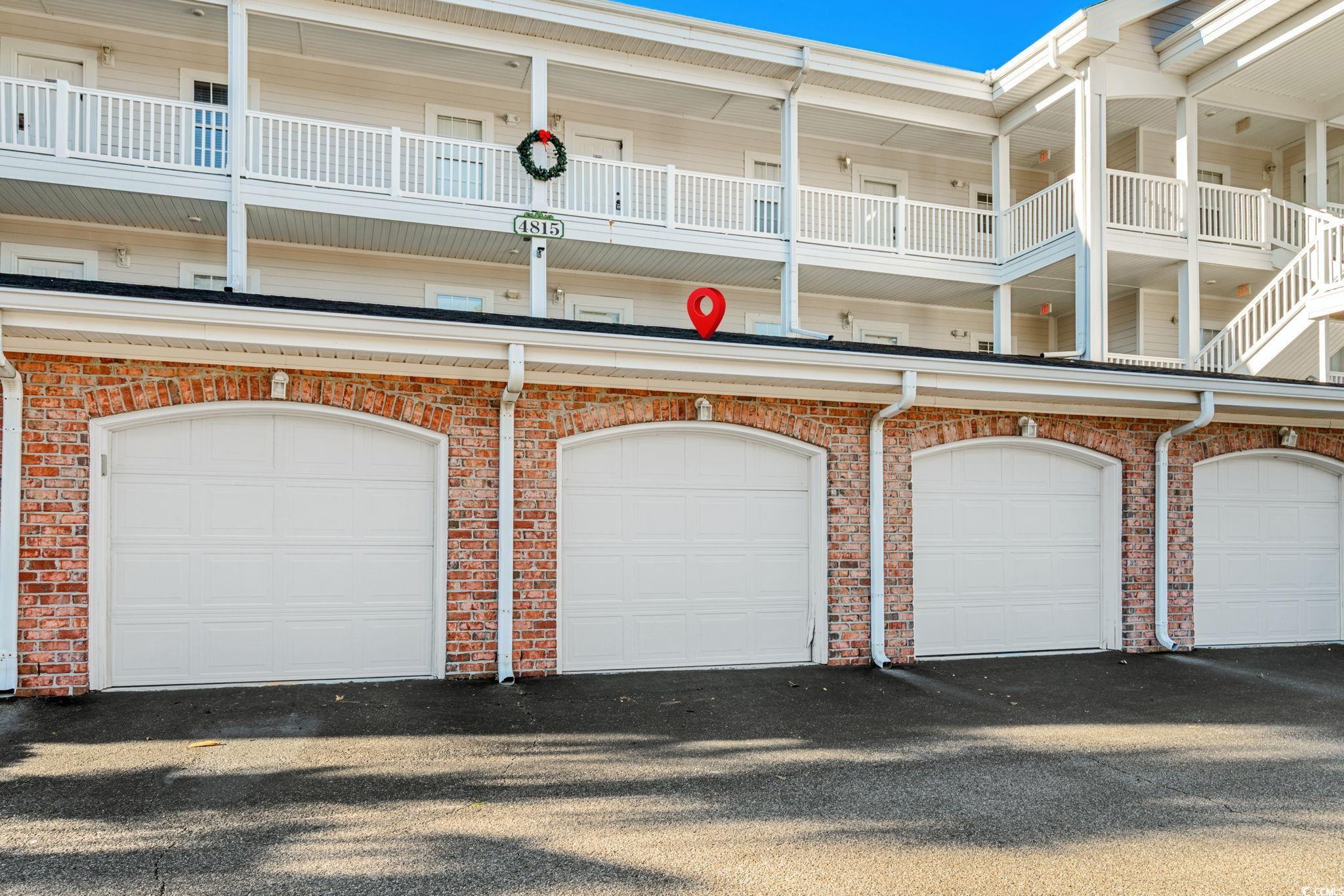 4815 Orchid Way, Unit 302 Myrtle Beach, SC 29577 - Photo 2 of 26 View of garage