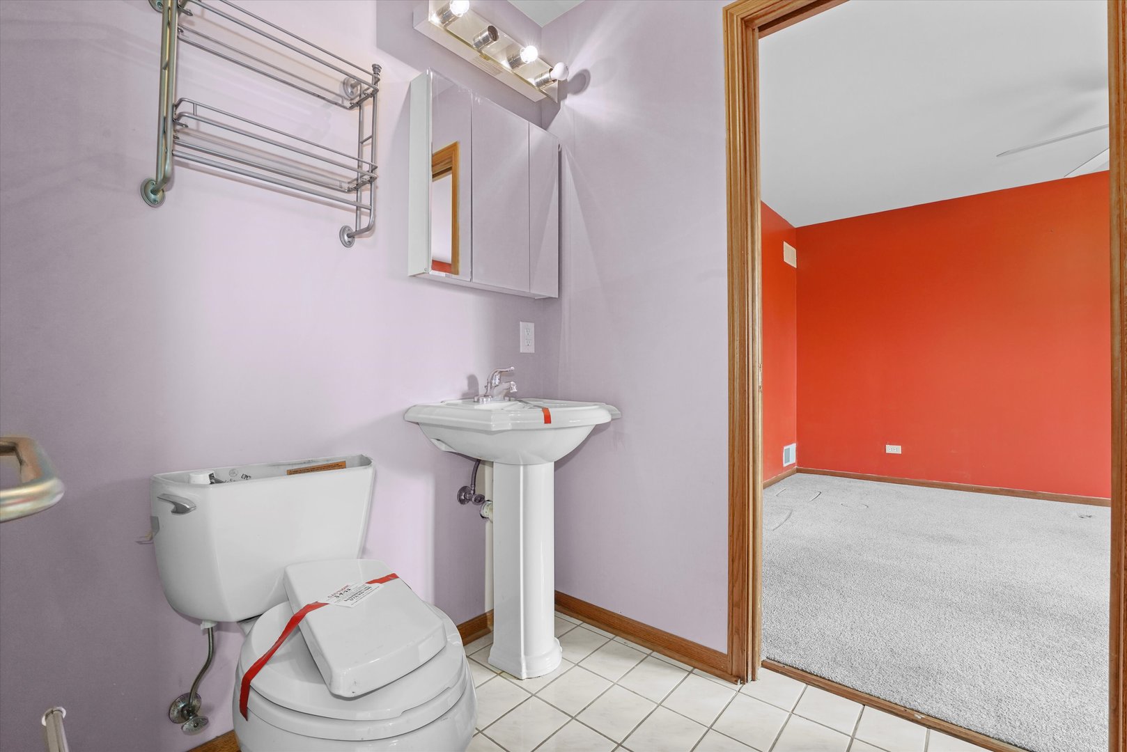 26554 South Winfield Road Monee, IL 60449 - Photo 17 of 31 a bathroom with a sink a toilet and mirror