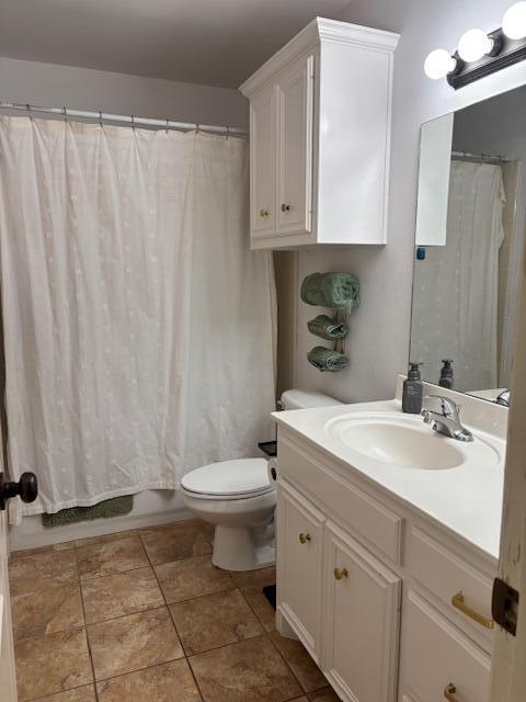 6303 112th Street Lubbock, TX 79424 - Photo 12 of 18 a bathroom with a sink a toilet and shower