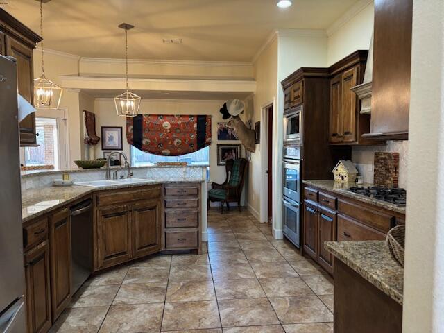 6303 112th Street Lubbock, TX 79424 - Photo 6 of 18 a kitchen with stainless steel appliances granite countertop a sink and cabinets