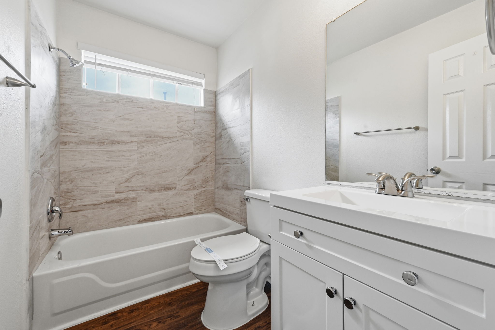11145 Franklins Tale Loop Austin, TX 78748 - Photo 17 of 31 a bathroom with a sink a toilet and a bathtub