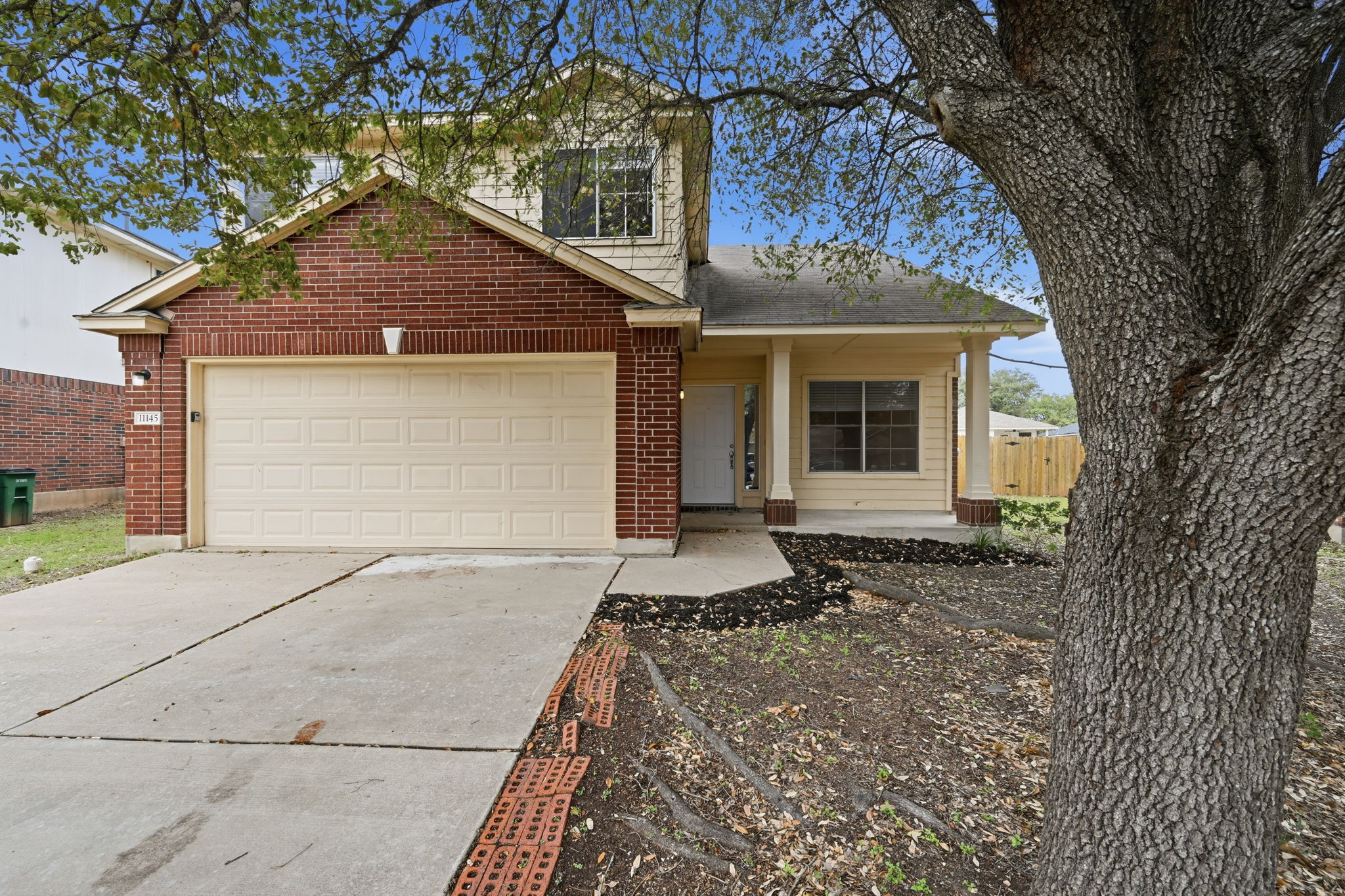 11145 Franklins Tale Loop Austin, TX 78748 - Photo 3 of 31 a front view of a house with a yard