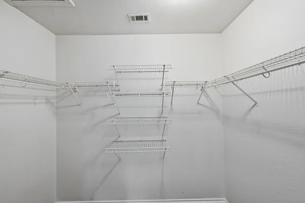 a view of a room with racks on the wall