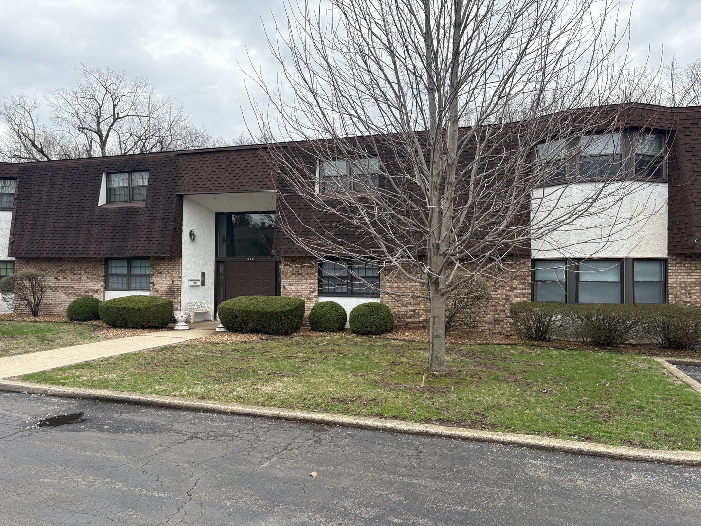 1070 South Nelson Avenue, Unit 2 Kankakee, IL 60901 - Photo 2 of 9 a view of a house with a patio