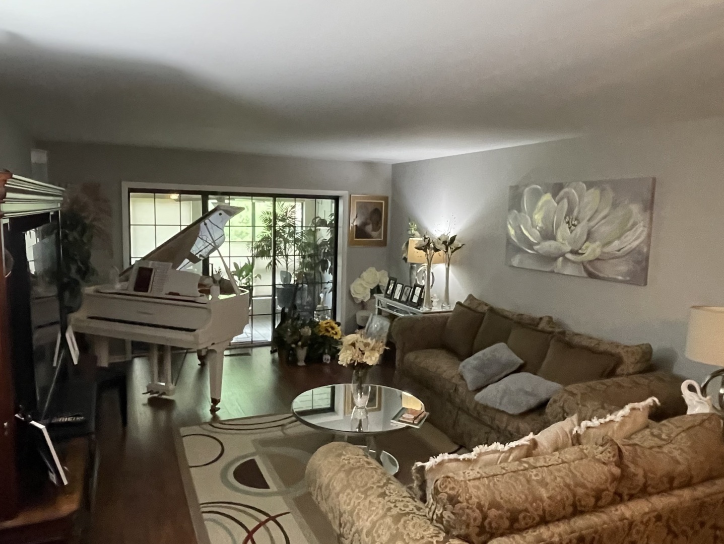 1070 South Nelson Avenue, Unit 2 Kankakee, IL 60901 - Photo 3 of 9 a living room with furniture and a large window