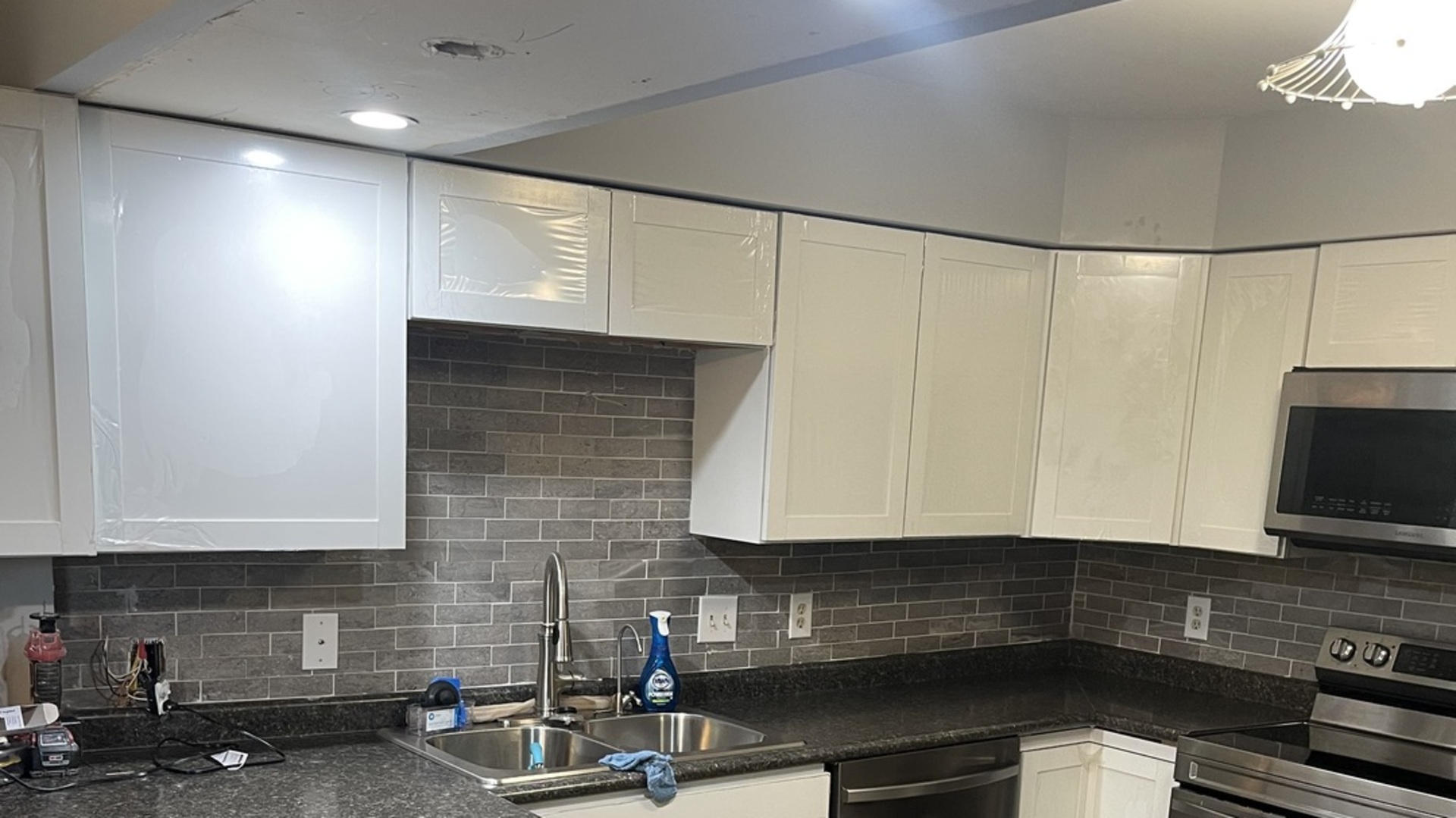 1070 South Nelson Avenue, Unit 2 Kankakee, IL 60901 - Photo 4 of 9 a kitchen with a sink and cabinets