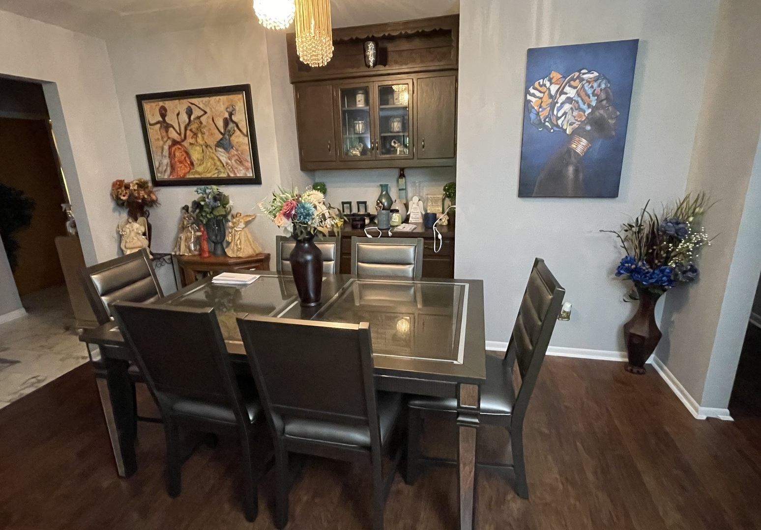 1070 South Nelson Avenue, Unit 2 Kankakee, IL 60901 - Photo 9 of 9 a view of a dining room with furniture and wooden floor