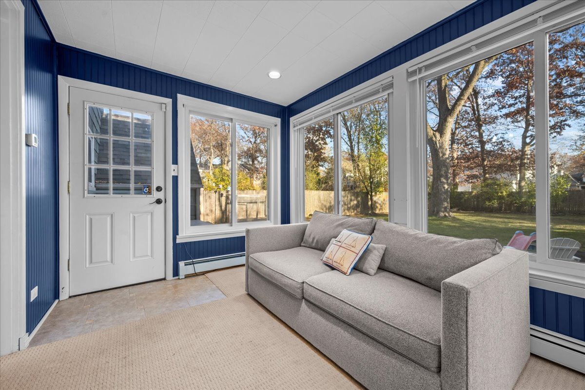 368 Woodland Road Highland Park, IL 60035 - Photo 12 of 29 a living room with furniture and a large window