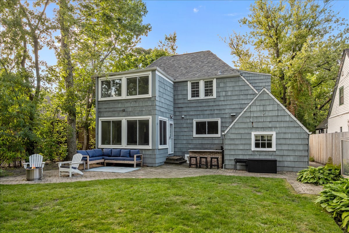 368 Woodland Road Highland Park, IL 60035 - Photo 24 of 29 a house view with a sitting space and garden