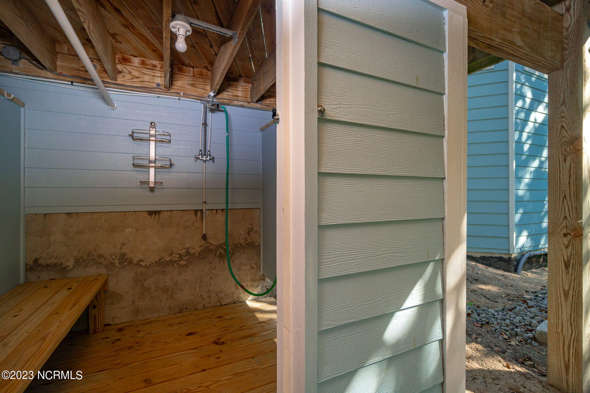 575 Coral Ridge Road Pine Knoll Shores, NC 28512 - Photo 50 of 73 Outdoor shower in back