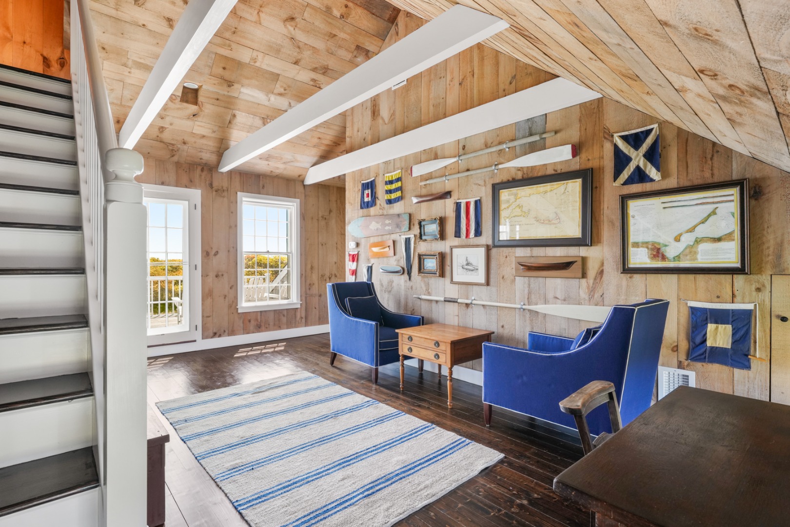 21 Quidnet Road Nantucket, MA 02554 - Photo 24 of 62 a living room with furniture and a floor to ceiling window