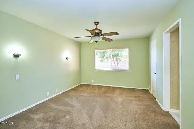 a view of a chandelier fan